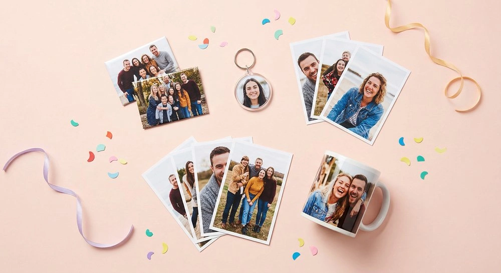 Budget-friendly personalised photo leaving gifts including magnets, keyring, photo cards, and mug arranged on a pastel background