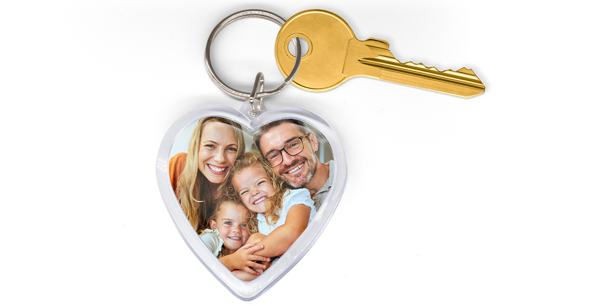 Herzförmiger Schlüsselanhänger mit Familienfoto und Schlüssel