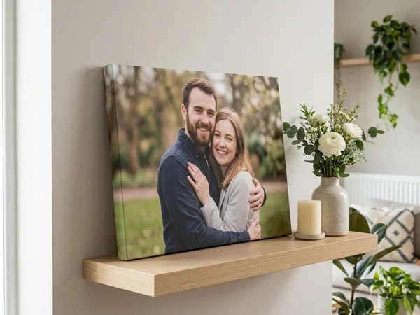 Engagement canvas print of a proposal photograph on a flat wall