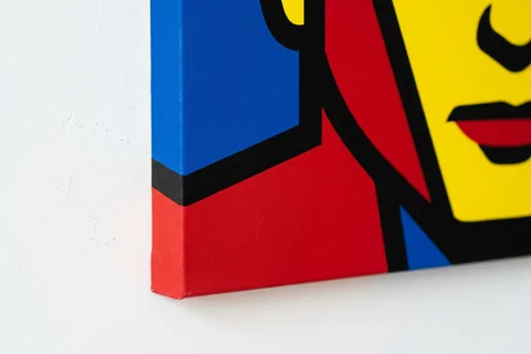 Close-up of the flat colour blocks on a pop art canvas